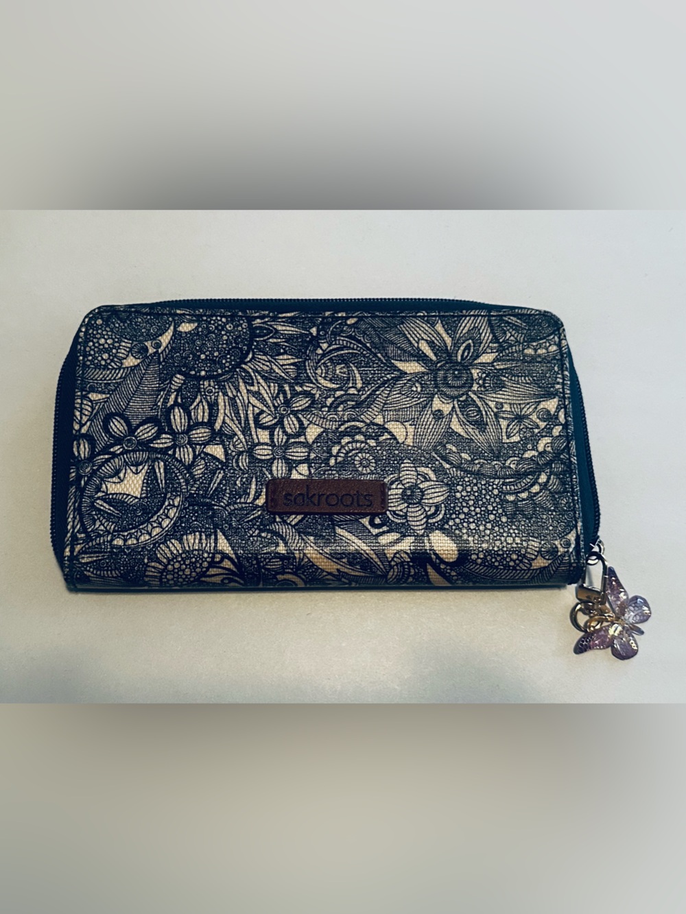 Sakroots Navy and Cream Floral Zip-Around Wallet with Butterfly Charm - Picture 2 of 6
